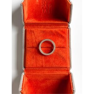 By pariah triple line diamond band.